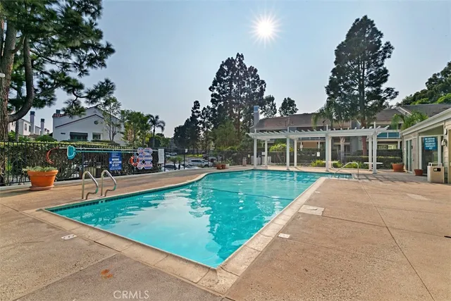 a view of a house with swimming pool