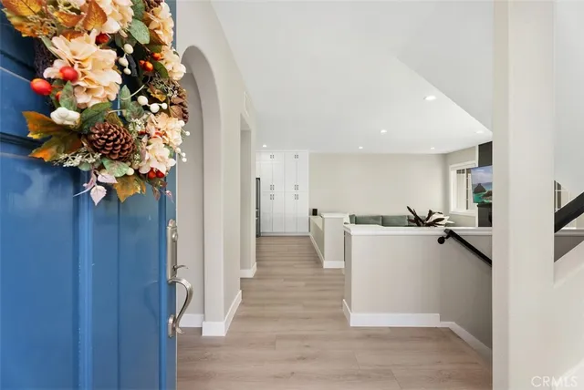a view of kitchen with furniture and wooden floor