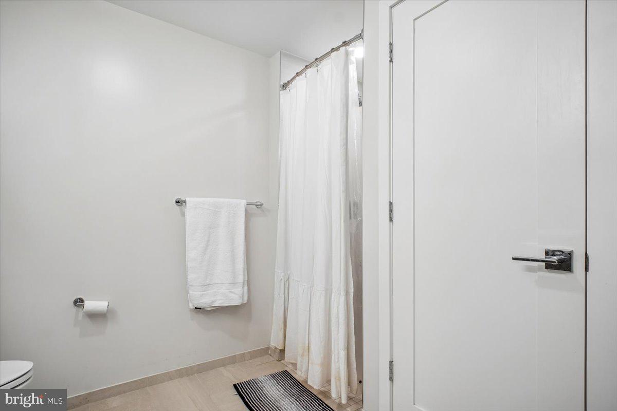 1211 Van Street Southeast, Unit 403 Washington, DC 20003 - Photo 19 of 21 a bathroom with a shower