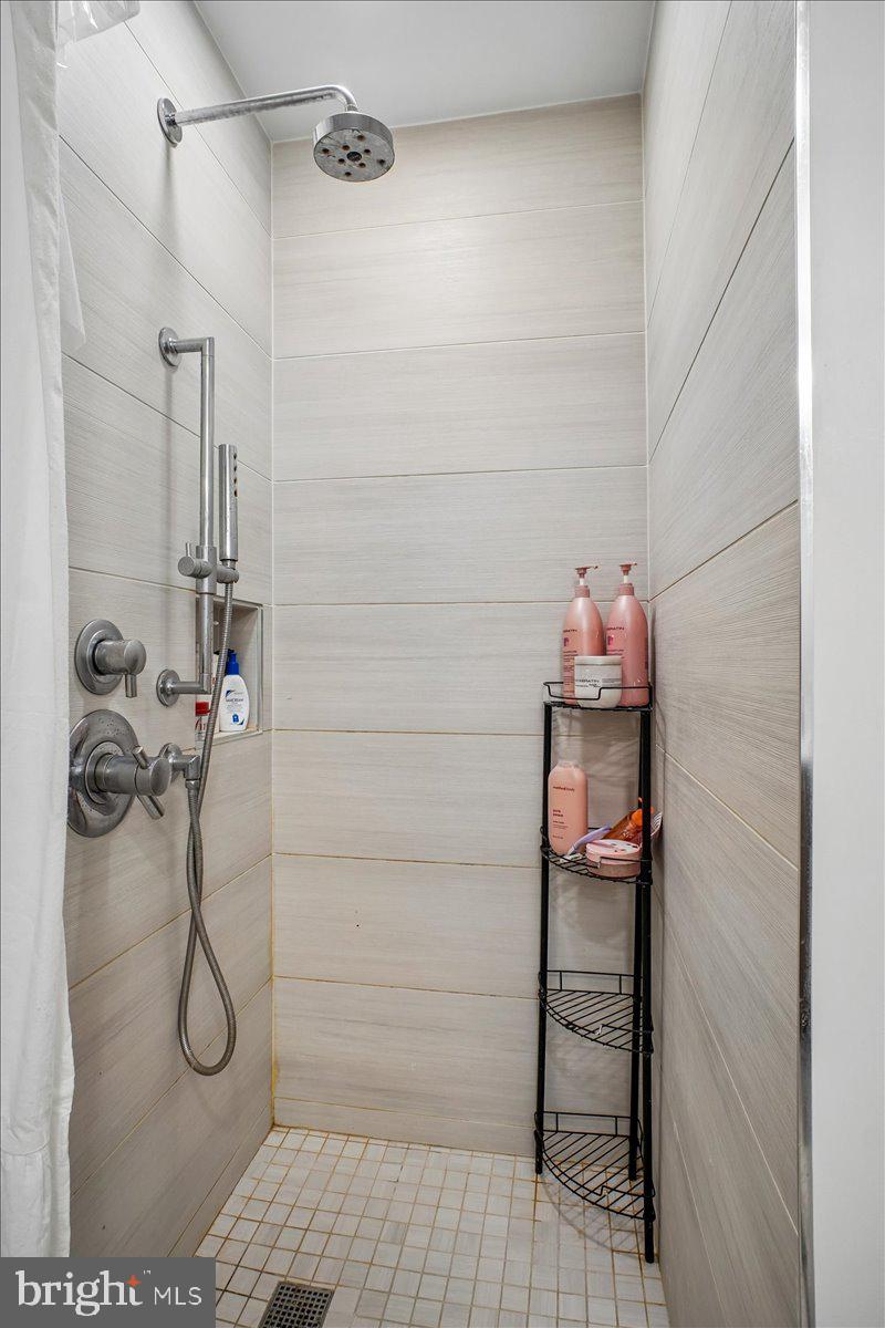 1211 Van Street Southeast, Unit 403 Washington, DC 20003 - Photo 20 of 21 a bathroom with a shower