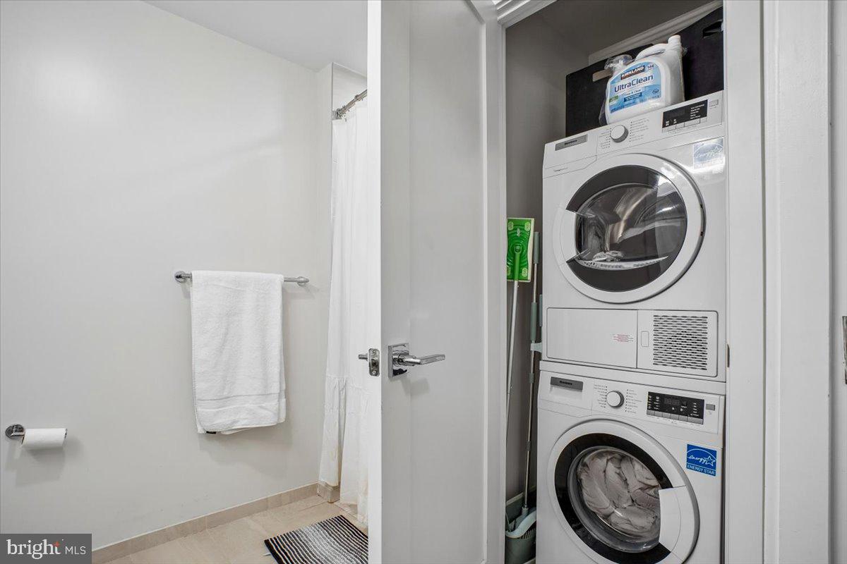 1211 Van Street Southeast, Unit 403 Washington, DC 20003 - Photo 21 of 21 a utility room with dryer and washer