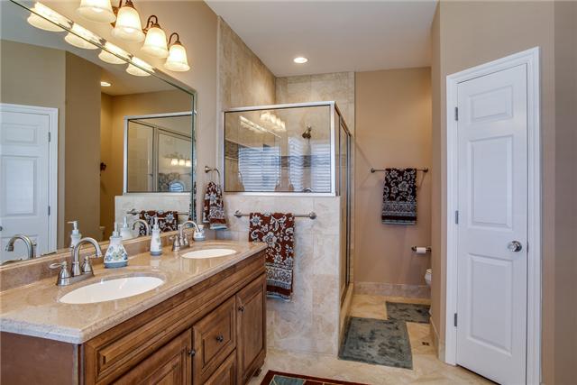 6288 Arno Road Franklin, TN 37064 - Photo 10 of 20 a bathroom with a sink double vanity and a mirror