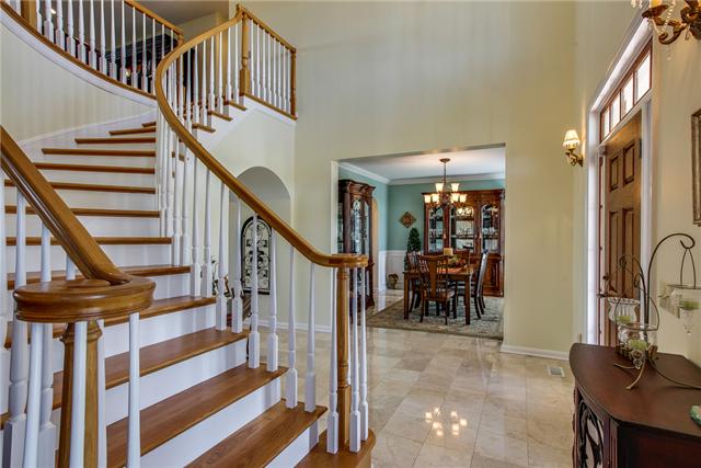 6288 Arno Road Franklin, TN 37064 - Photo 3 of 20 a view of entryway and hall with dining room
