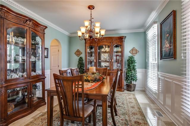 6288 Arno Road Franklin, TN 37064 - Photo 5 of 20 a view of a dining room with furniture window and wooden floor