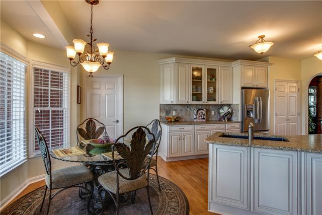 6288 Arno Road Franklin, TN 37064 - Photo 7 of 20 a view of a kitchen with granite countertop furniture a sink and dishwasher
