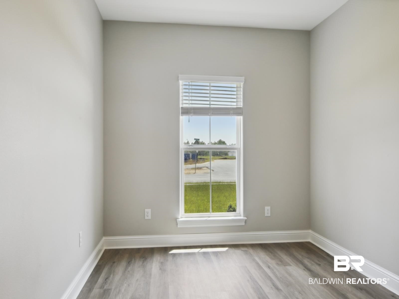 23937 Peppermint Street Elberta, AL 36530 - Photo 15 of 22 Spare room with wood finished floors and baseboards