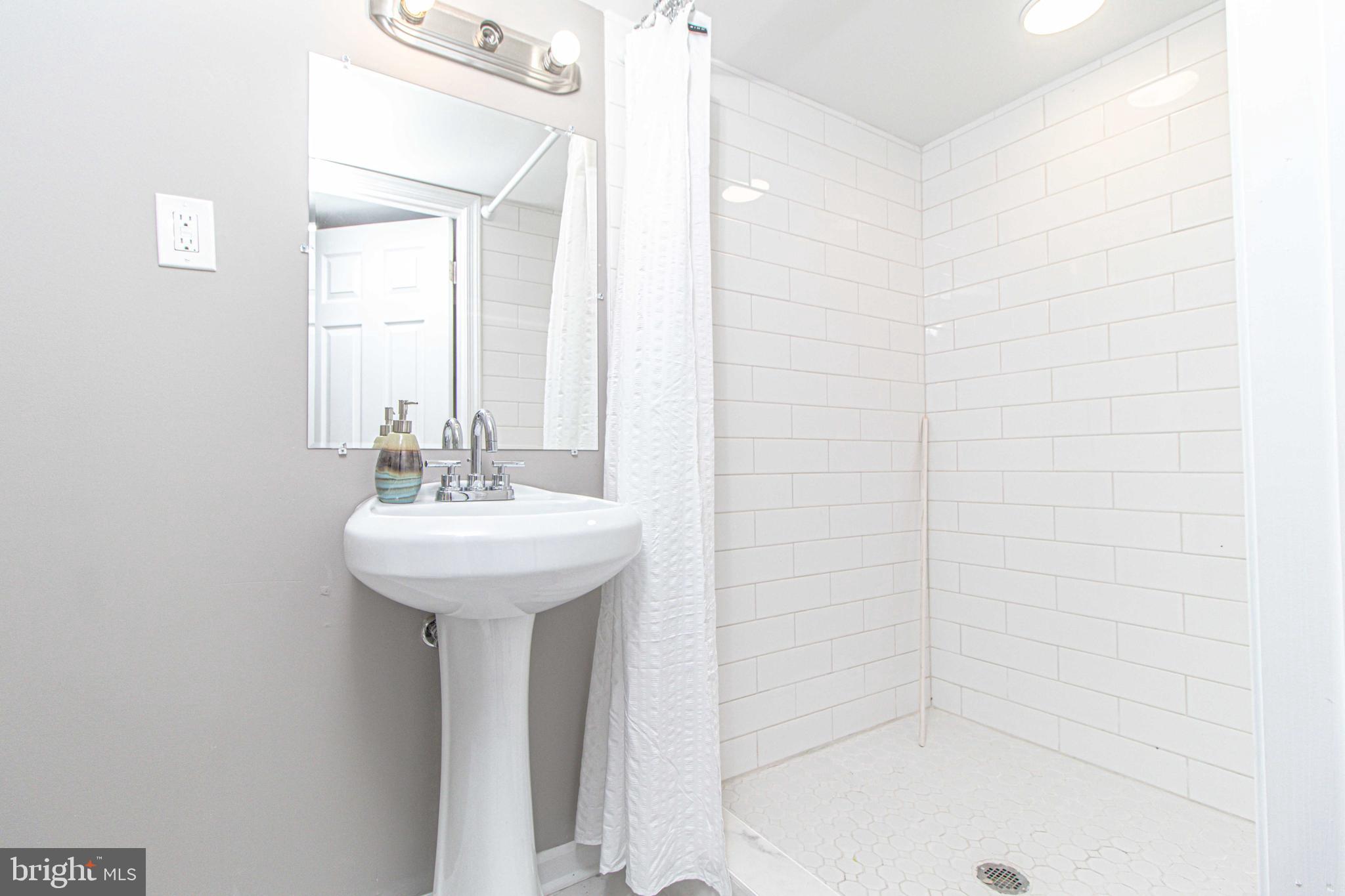 7019 Sollers Point Road Baltimore, MD 21222 - Photo 43 of 57 Lower Level Full Bathroom!