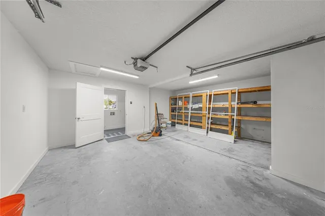 an empty room with a walk in closet and stairs