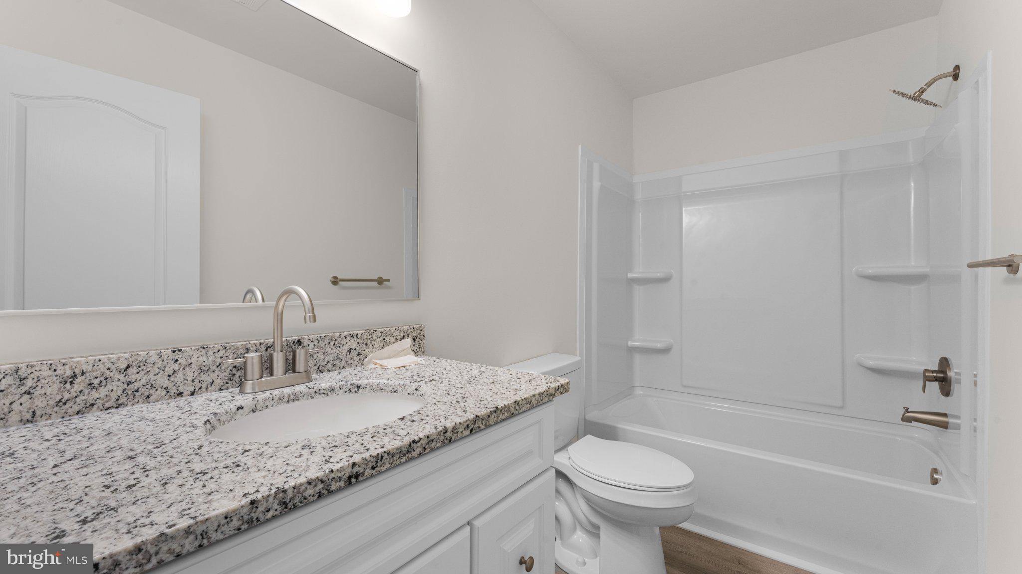 706 Carter Road Magnolia, DE 19962 - Photo 24 of 62 Modern bathroom with elegant finishes.