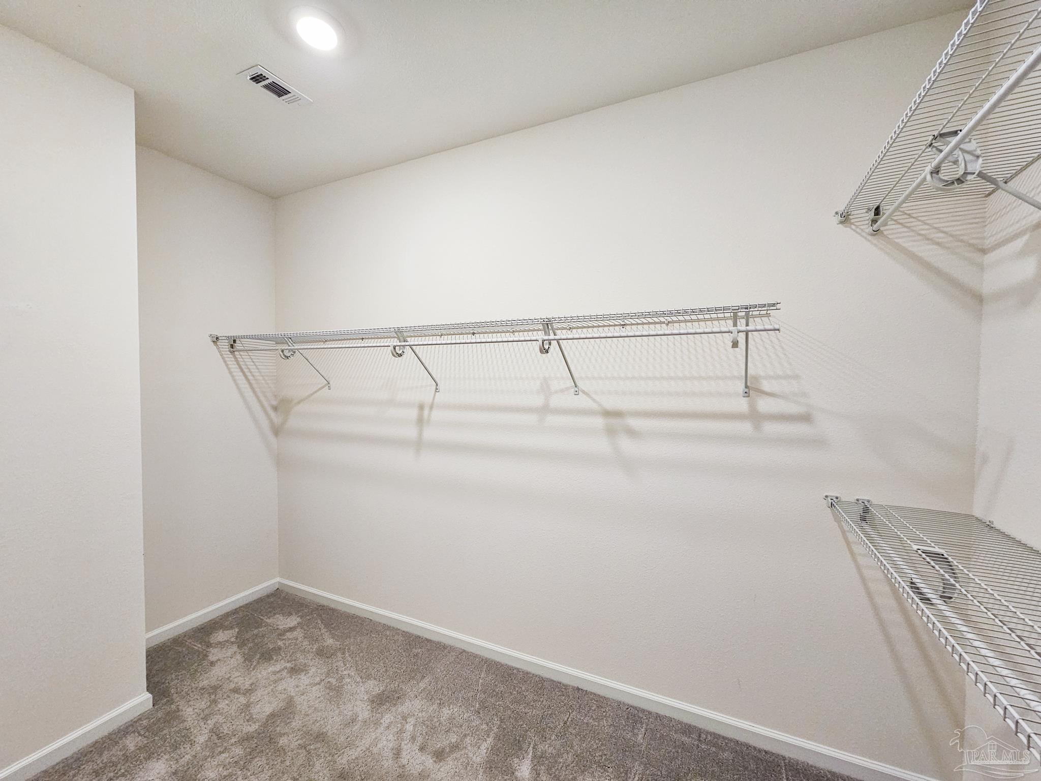 4149 Upper Walk Lane Milton, FL 32583 - Photo 18 of 43 a view of an empty walk in closet