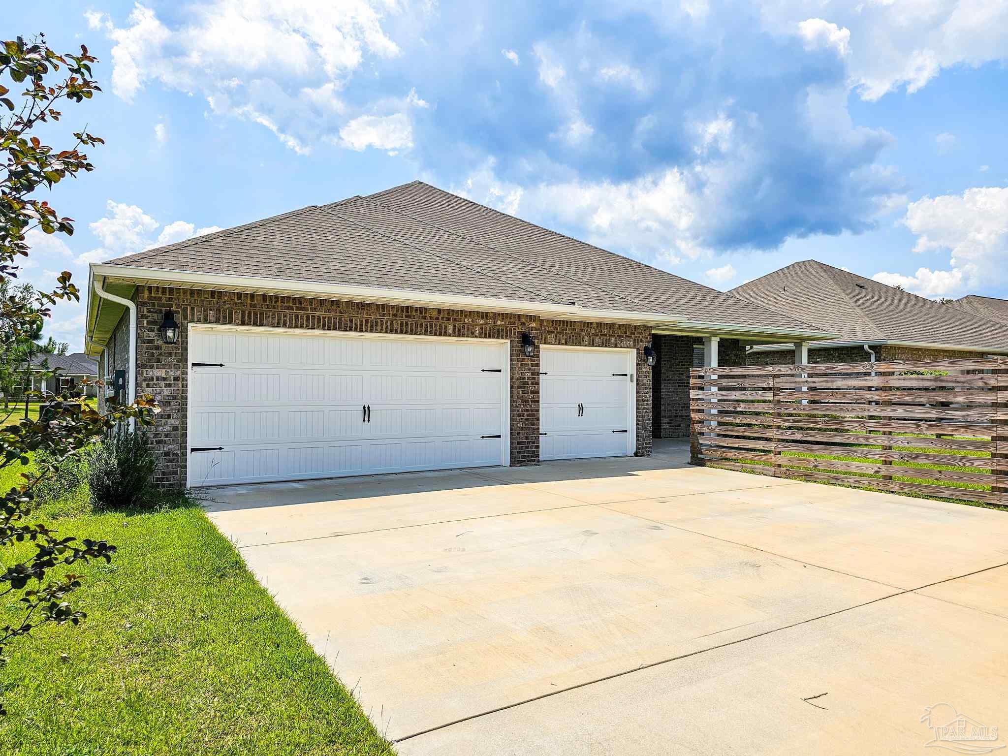 4149 Upper Walk Lane Milton, FL 32583 - Photo 36 of 43 a front view of house with yard