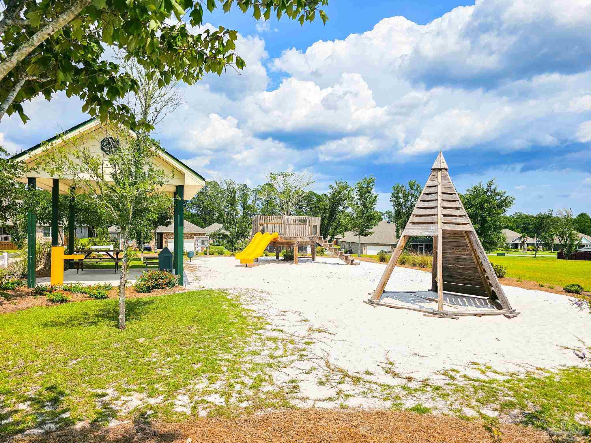4149 Upper Walk Lane Milton, FL 32583 - Photo 39 of 43 a view of a swimming pool with a lounge chairs