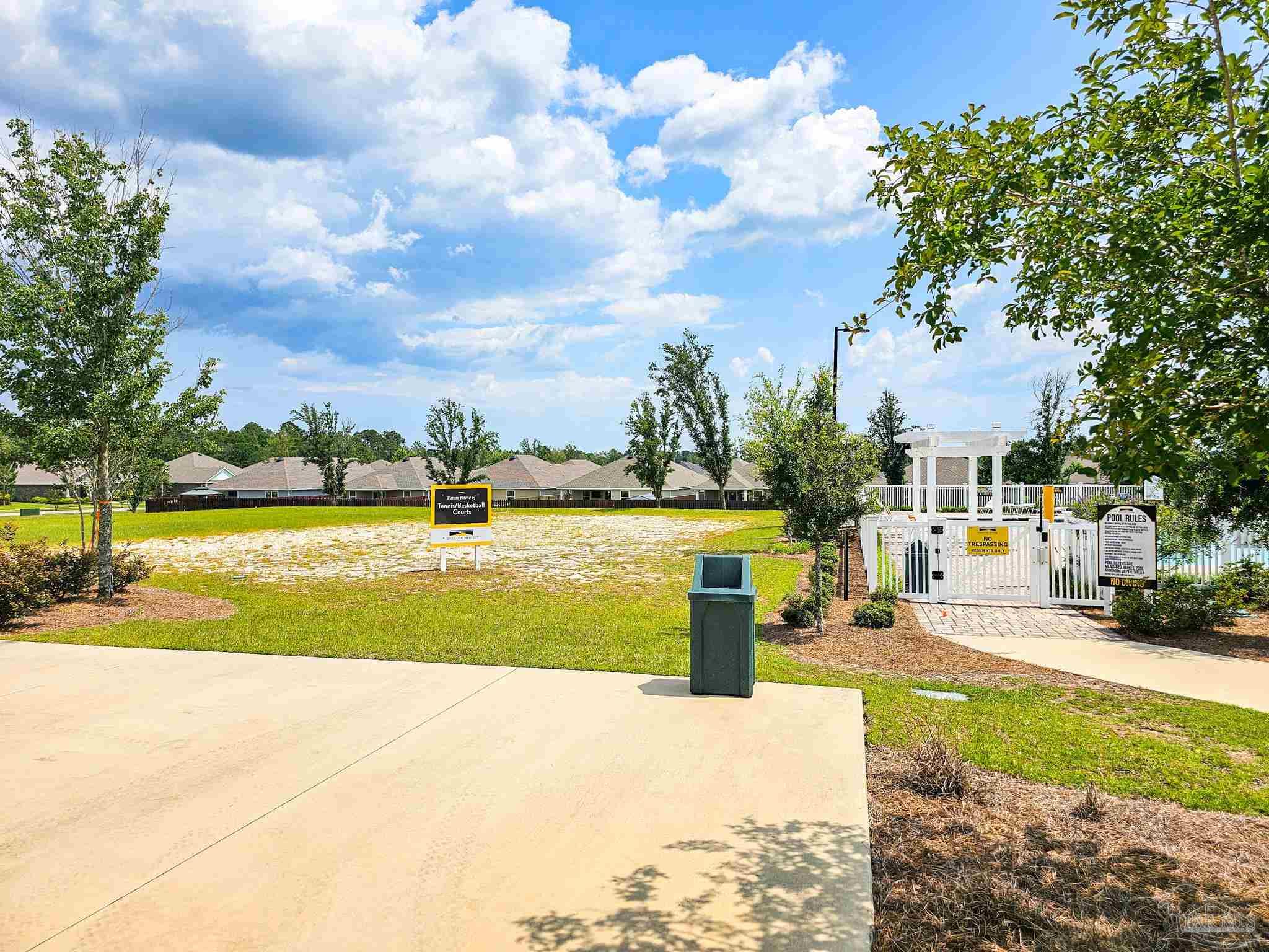 4149 Upper Walk Lane Milton, FL 32583 - Photo 41 of 43 a view of yard with swimming pool and outdoor seating