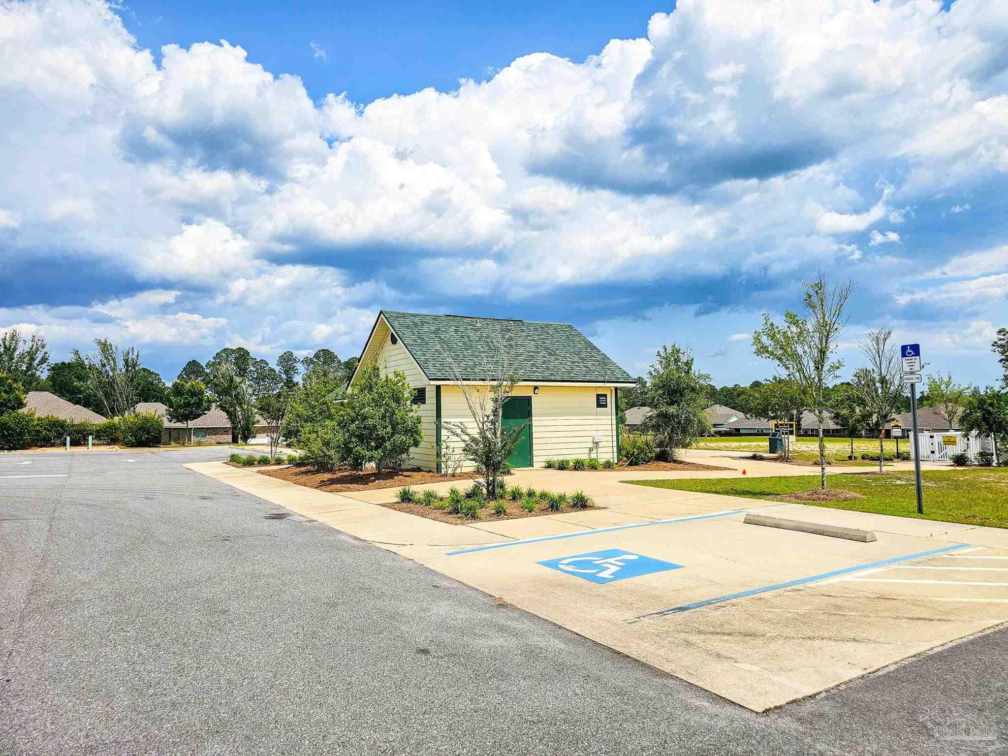4149 Upper Walk Lane Milton, FL 32583 - Photo 42 of 43 a view of an house with swimming pool and mountains in the background