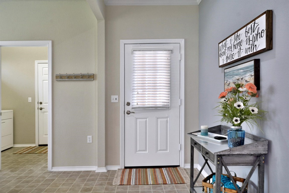 247 Bonham Loop Georgetown, TX 78633 - Photo 16 of 32 a view of an entryway with wooden floor