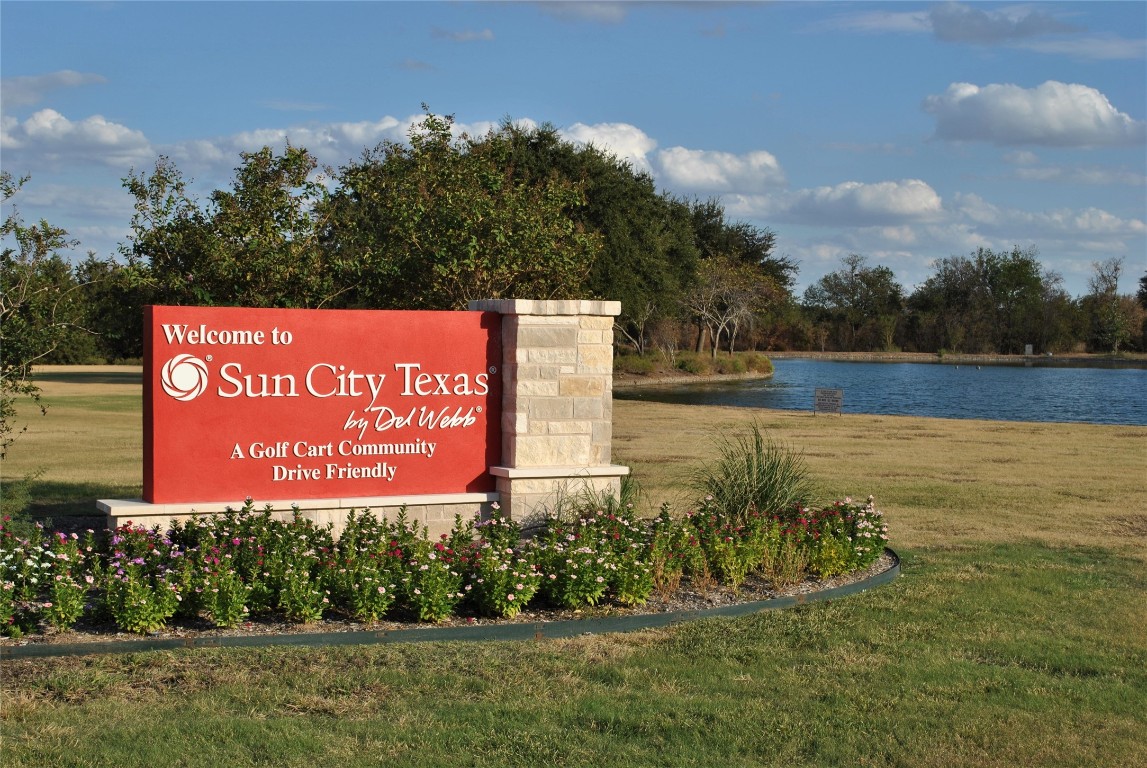 247 Bonham Loop Georgetown, TX 78633 - Photo 25 of 32 a sign that is sitting on the side of a road