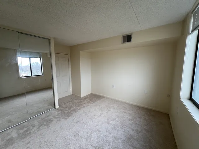 an empty room with windows