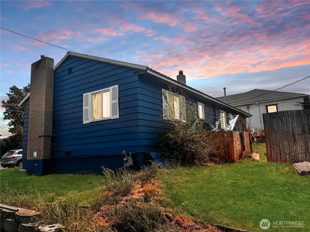 a backyard of a house with lots of green space