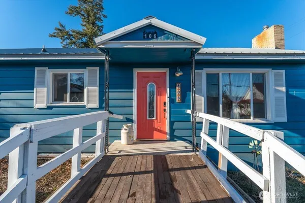 a view of brick building with a large window