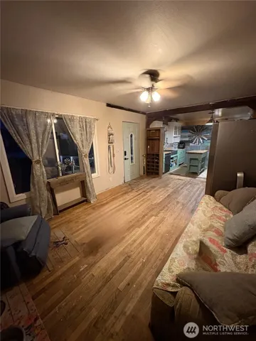 a spacious bedroom with a bed and a walk in closet