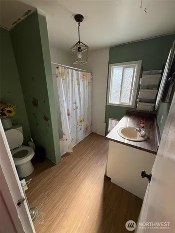 a room with gym equipment and a mirror