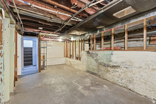 215 East 300 South Logan, UT 84321 - Photo 21 of 32 Unfinished below grade area featuring stairs