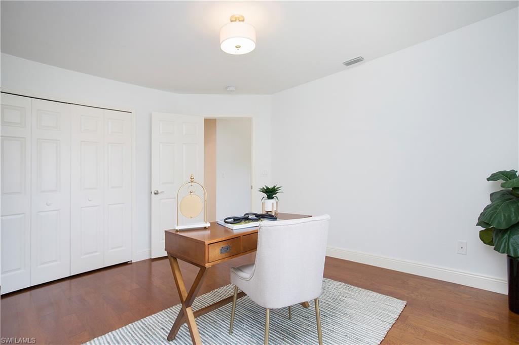 1534 Northgate Drive Naples, FL 34105 - Photo 25 of 50 a dining room with furniture and wooden floor
