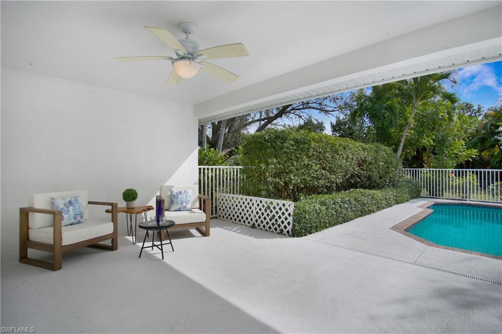 1534 Northgate Drive Naples, FL 34105 - Photo 30 of 50 a garden view with a seating space