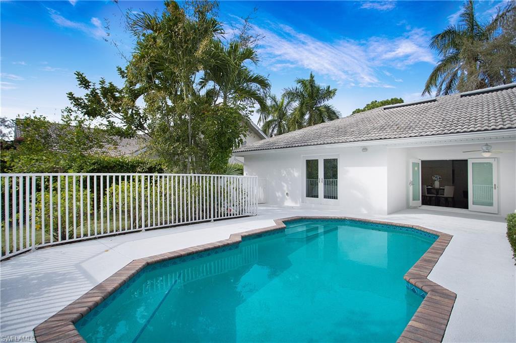 1534 Northgate Drive Naples, FL 34105 - Photo 39 of 50 a view of a backyard with a garden