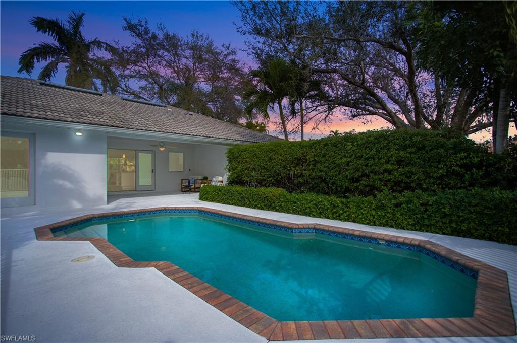 1534 Northgate Drive Naples, FL 34105 - Photo 40 of 50 a view of swimming pool from a balcony