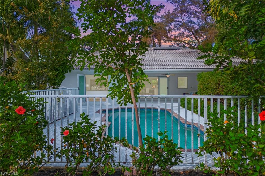 1534 Northgate Drive Naples, FL 34105 - Photo 46 of 50 a view of a garden with plants