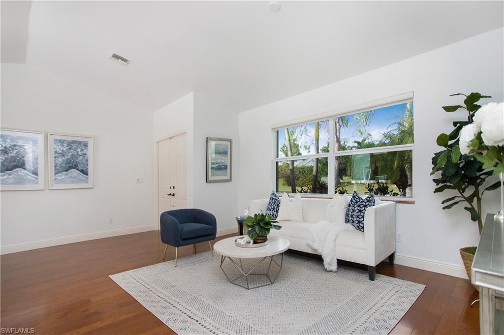 1534 Northgate Drive Naples, FL 34105 - Photo 6 of 50 a living room with furniture and a potted plant