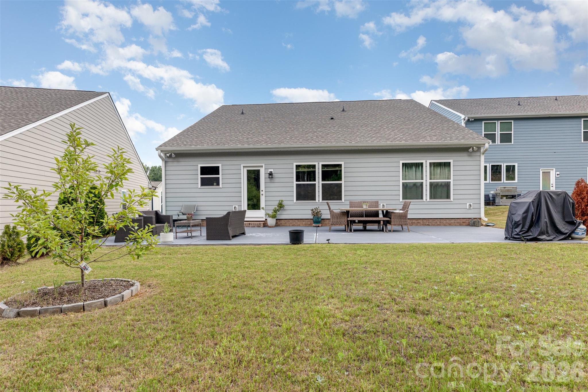 948 Scotch Meadows Loop Monroe, NC 28110 - Photo 24 of 25 a view of a house with swimming pool and sitting area