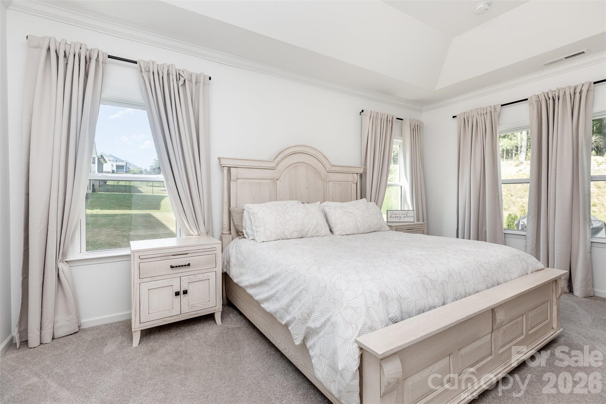 948 Scotch Meadows Loop Monroe, NC 28110 - Photo 5 of 25 a bedroom with a bed and a large window