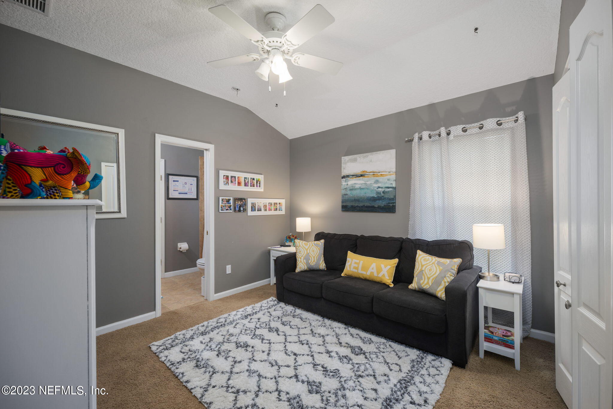 1075 Green Pine Circle Orange Park, FL 32065 - Photo 20 of 35 a living room with furniture and a rug