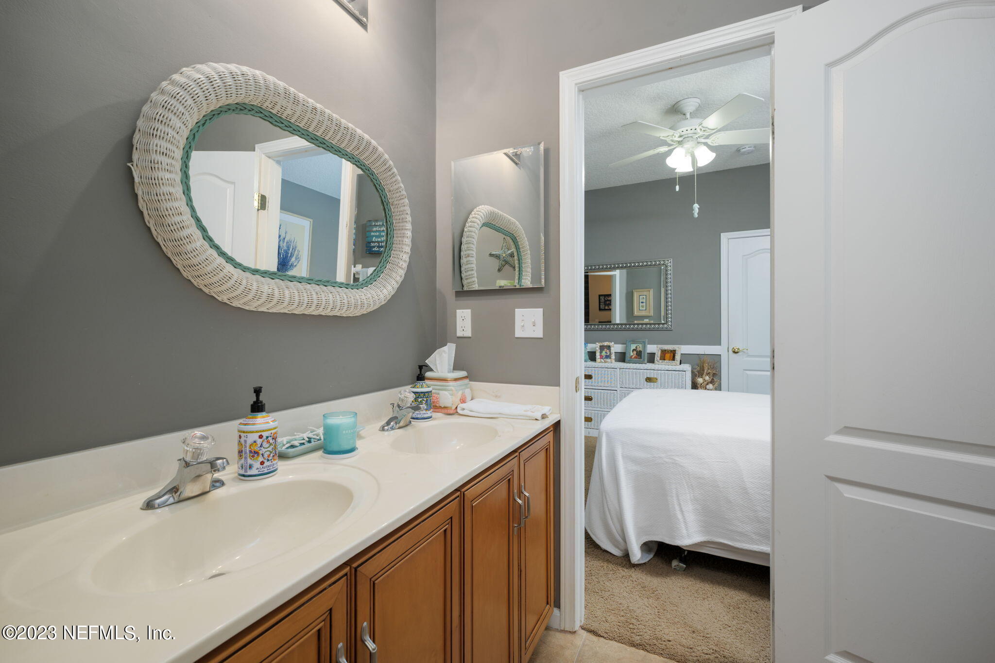 1075 Green Pine Circle Orange Park, FL 32065 - Photo 21 of 35 a en suite bathroom with a double vanity sink and a mirror