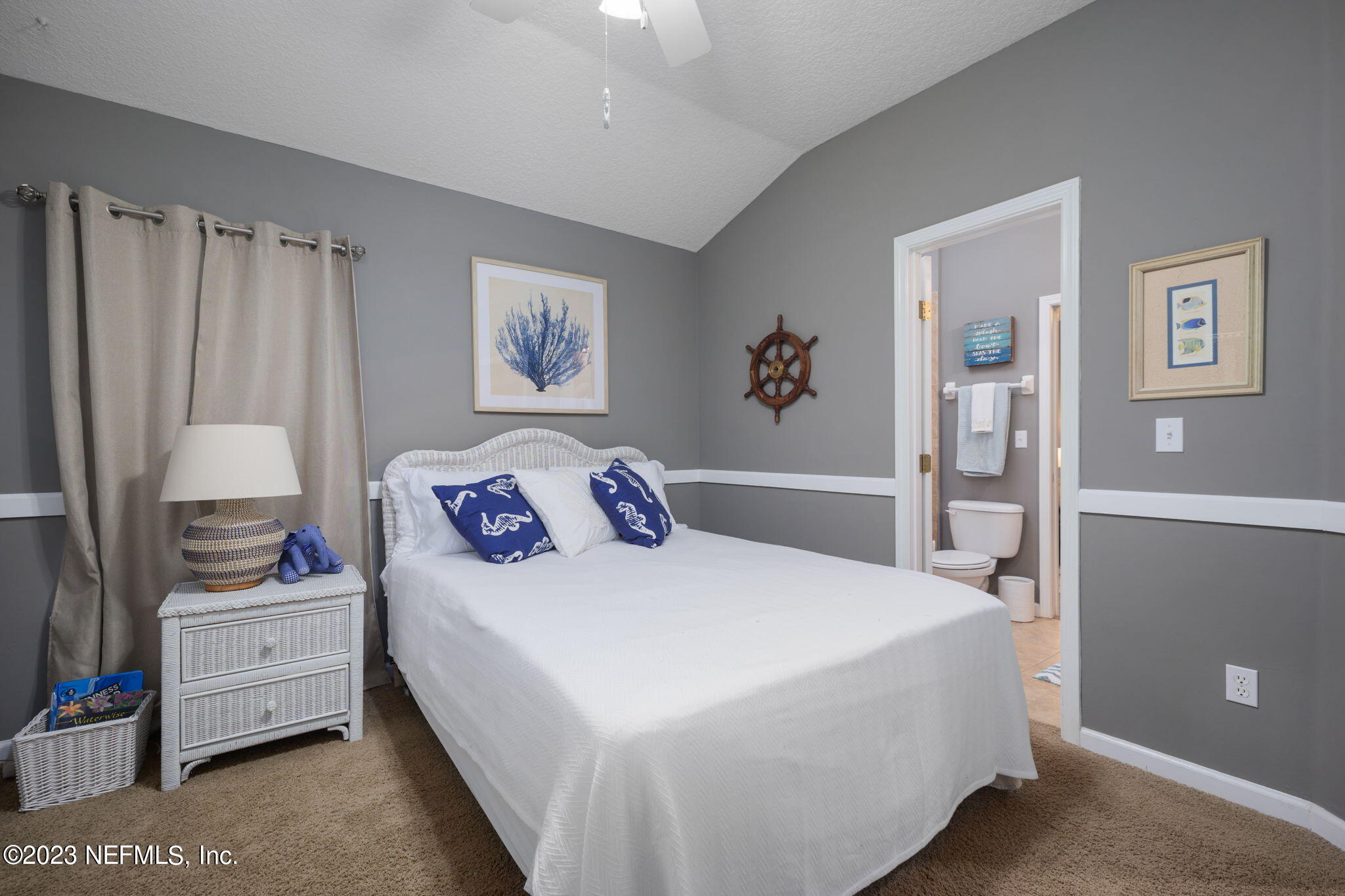 1075 Green Pine Circle Orange Park, FL 32065 - Photo 23 of 35 a bedroom with a bed and a cabinets