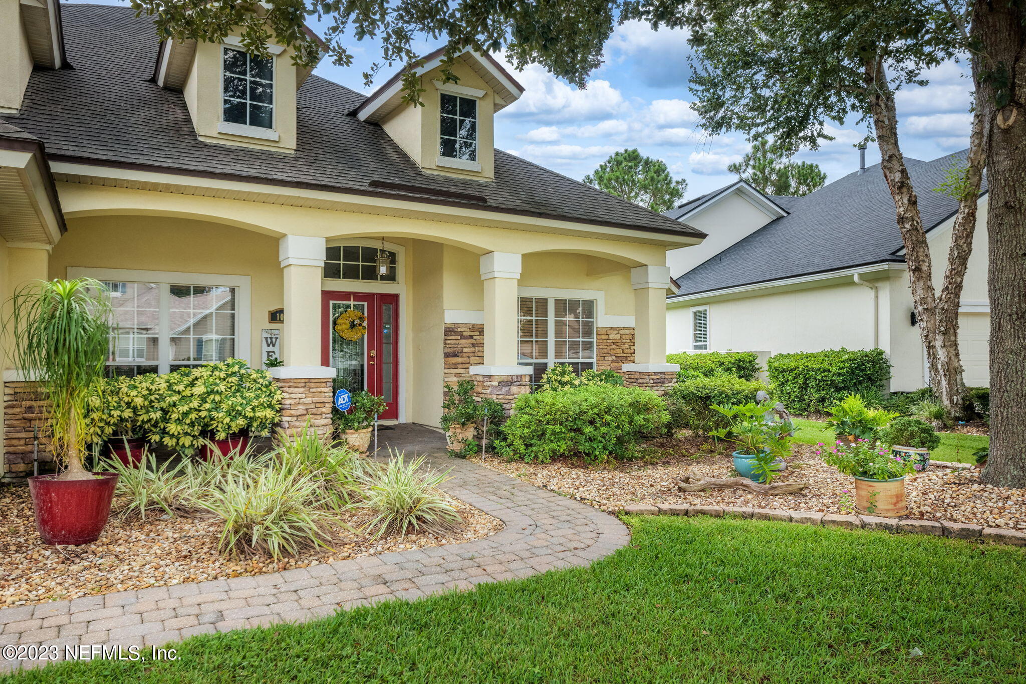 1075 Green Pine Circle Orange Park, FL 32065 - Photo 3 of 35 a front view of a house with a yard