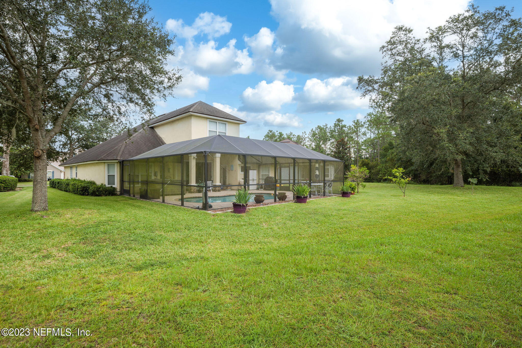 1075 Green Pine Circle Orange Park, FL 32065 - Photo 32 of 35 a front view of a house with a yard
