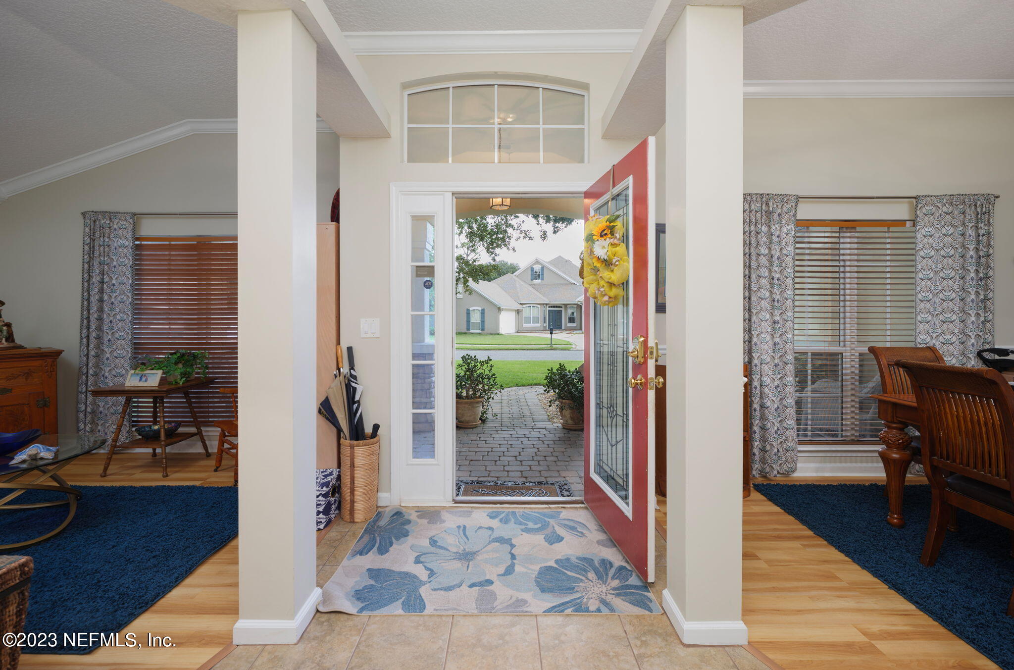 1075 Green Pine Circle Orange Park, FL 32065 - Photo 4 of 35 a view of a hallway with furniture and front door