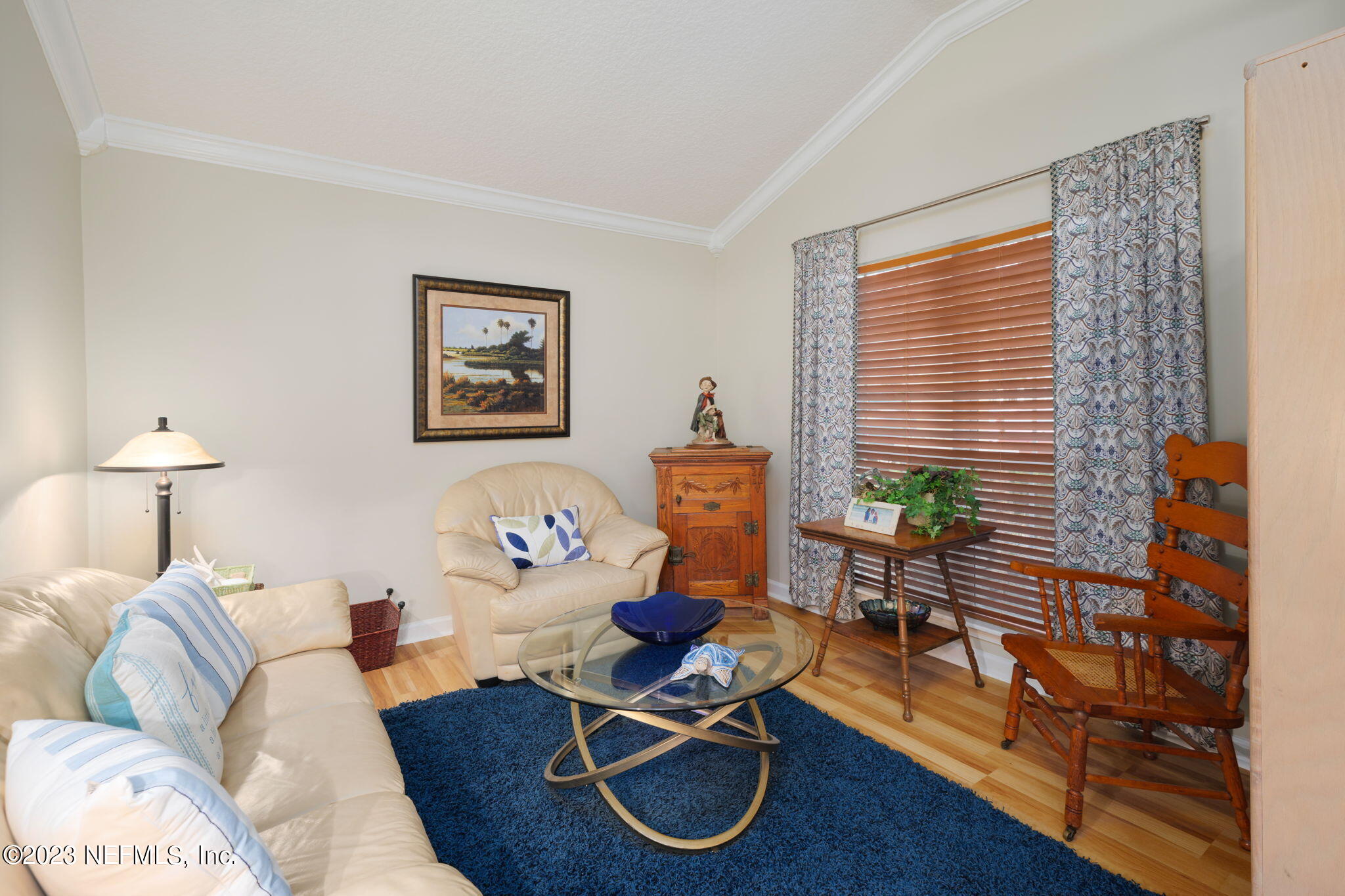 1075 Green Pine Circle Orange Park, FL 32065 - Photo 5 of 35 a living room with furniture and a lamp