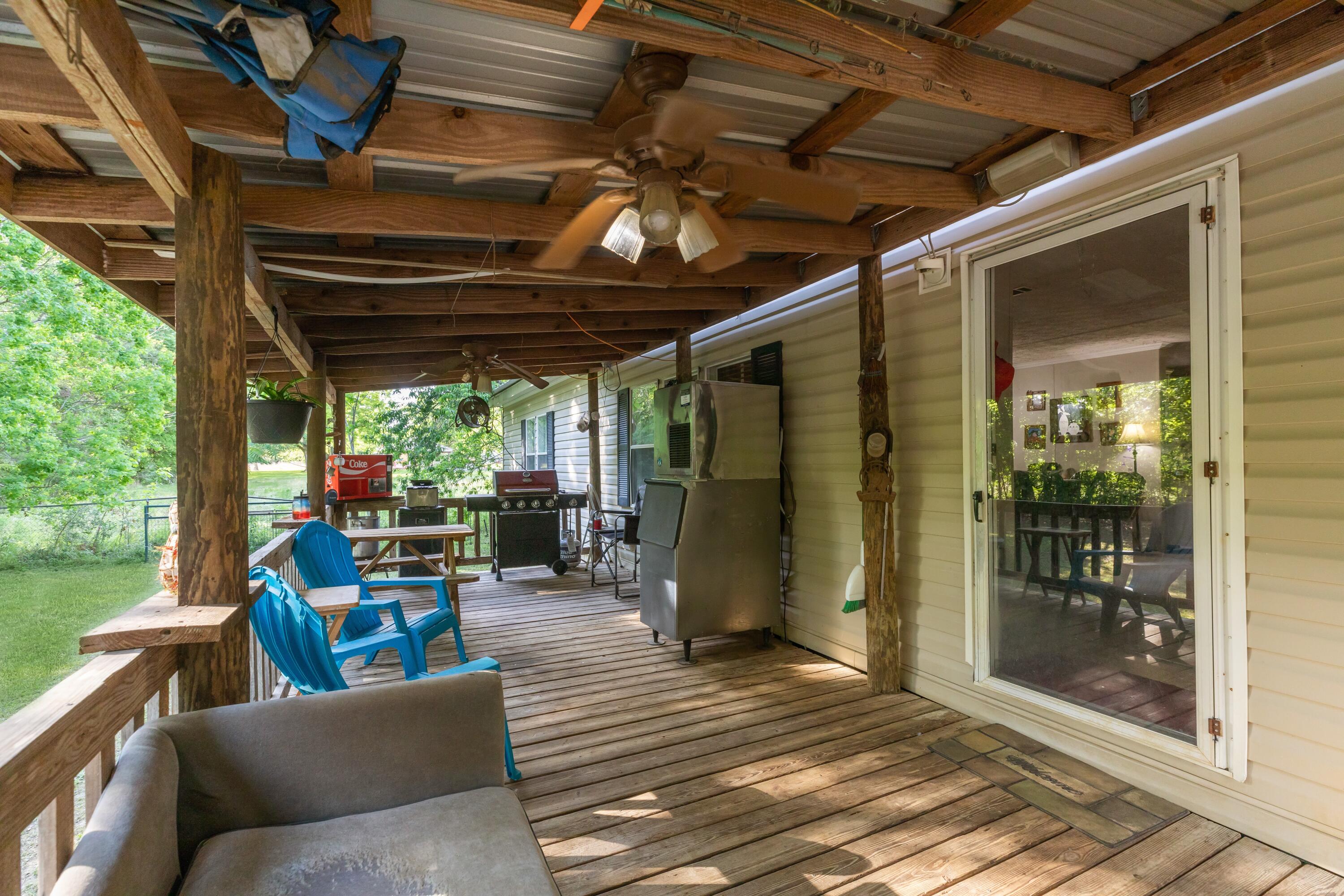 8495 Creston Barrow Road Baker, FL 32531 - Photo 6 of 35 a view of outdoor space with seating area