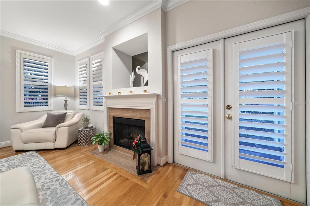 291 1st Avenue Southwest Largo, FL 33770 - Photo 20 of 83 a living room with furniture and a fireplace