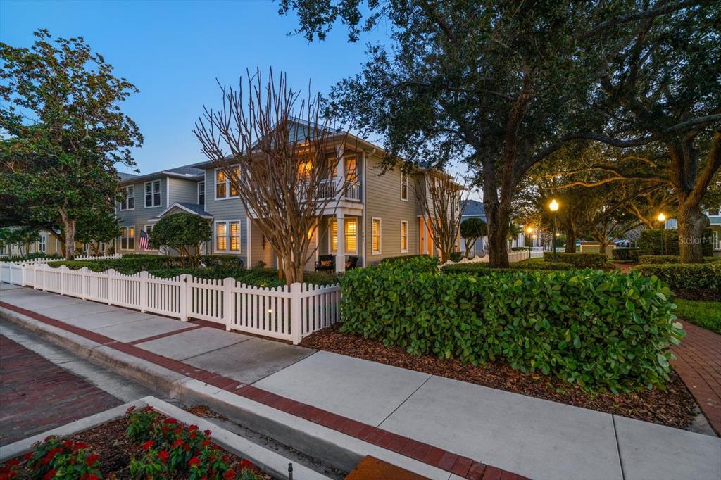 291 1st Avenue Southwest Largo, FL 33770 - Photo 2 of 83 a front view of a house with a garden