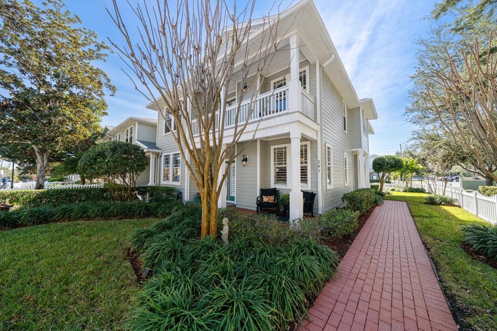 291 1st Avenue Southwest Largo, FL 33770 - Photo 4 of 83 a front view of a house with a yard and potted plants