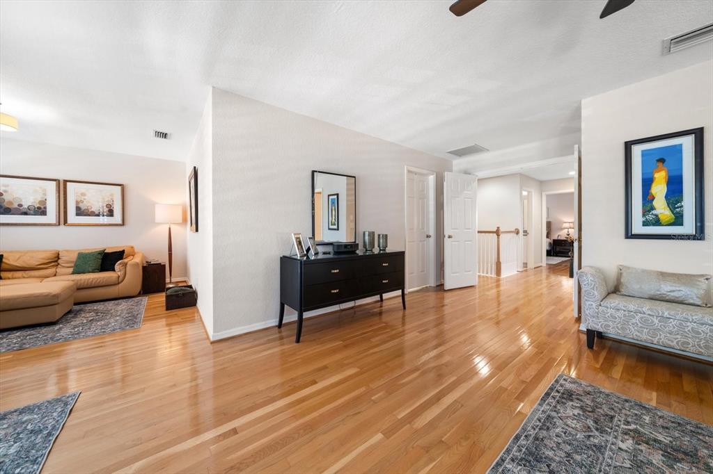 291 1st Avenue Southwest Largo, FL 33770 - Photo 46 of 83 a living room with furniture and a wooden floor