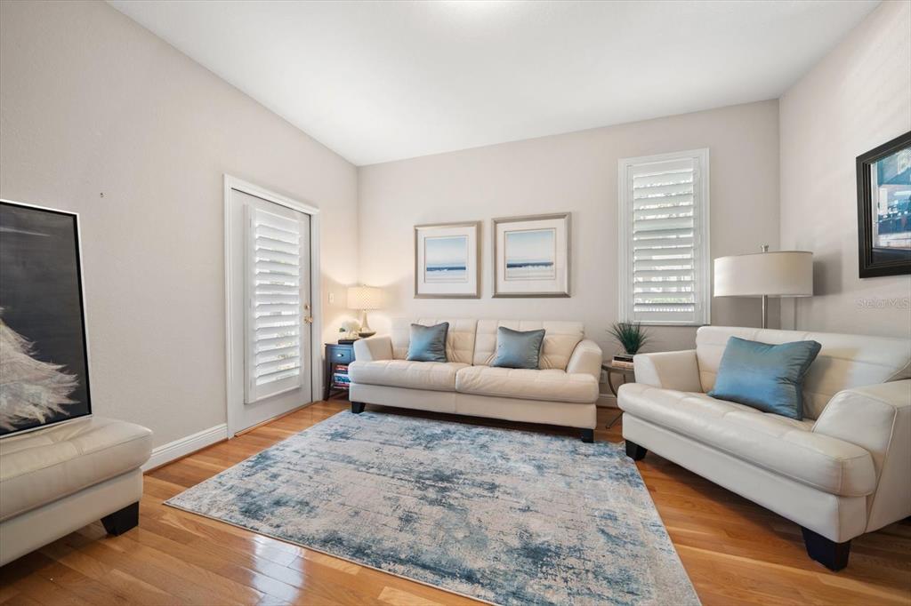 291 1st Avenue Southwest Largo, FL 33770 - Photo 55 of 83 a living room with furniture and a couch
