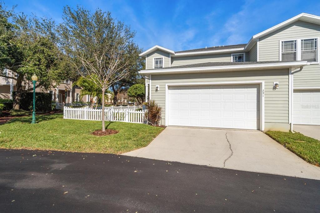 291 1st Avenue Southwest Largo, FL 33770 - Photo 67 of 83 a front view of a house with a yard and garage