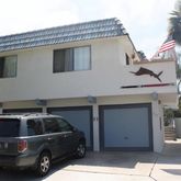 a car parked in front of a house
