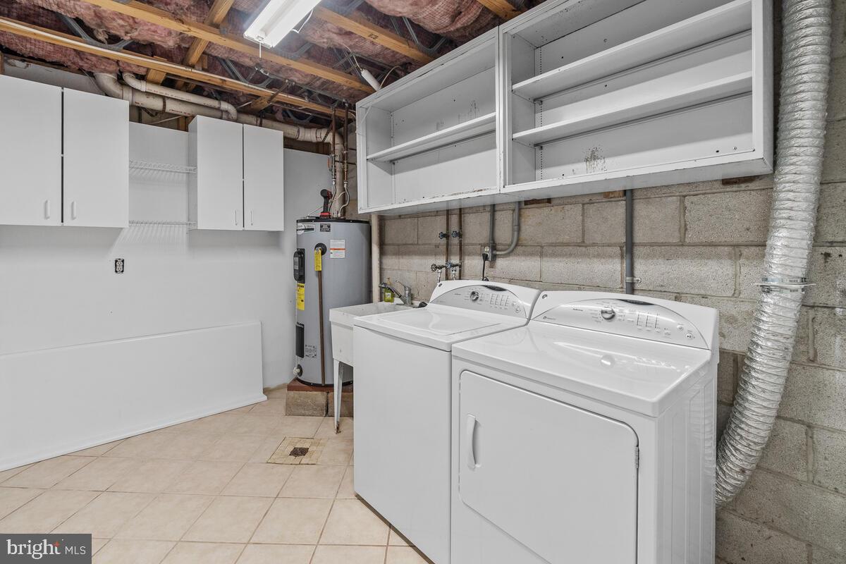 14134 Harrisville Road Mount Airy, MD 21771 - Photo 23 of 41 Large laundry room with cabinet space.